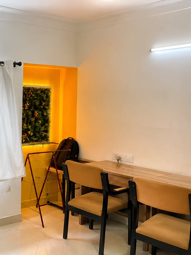 Dedicated student study room tables and chairs at Pune Centre Hostel